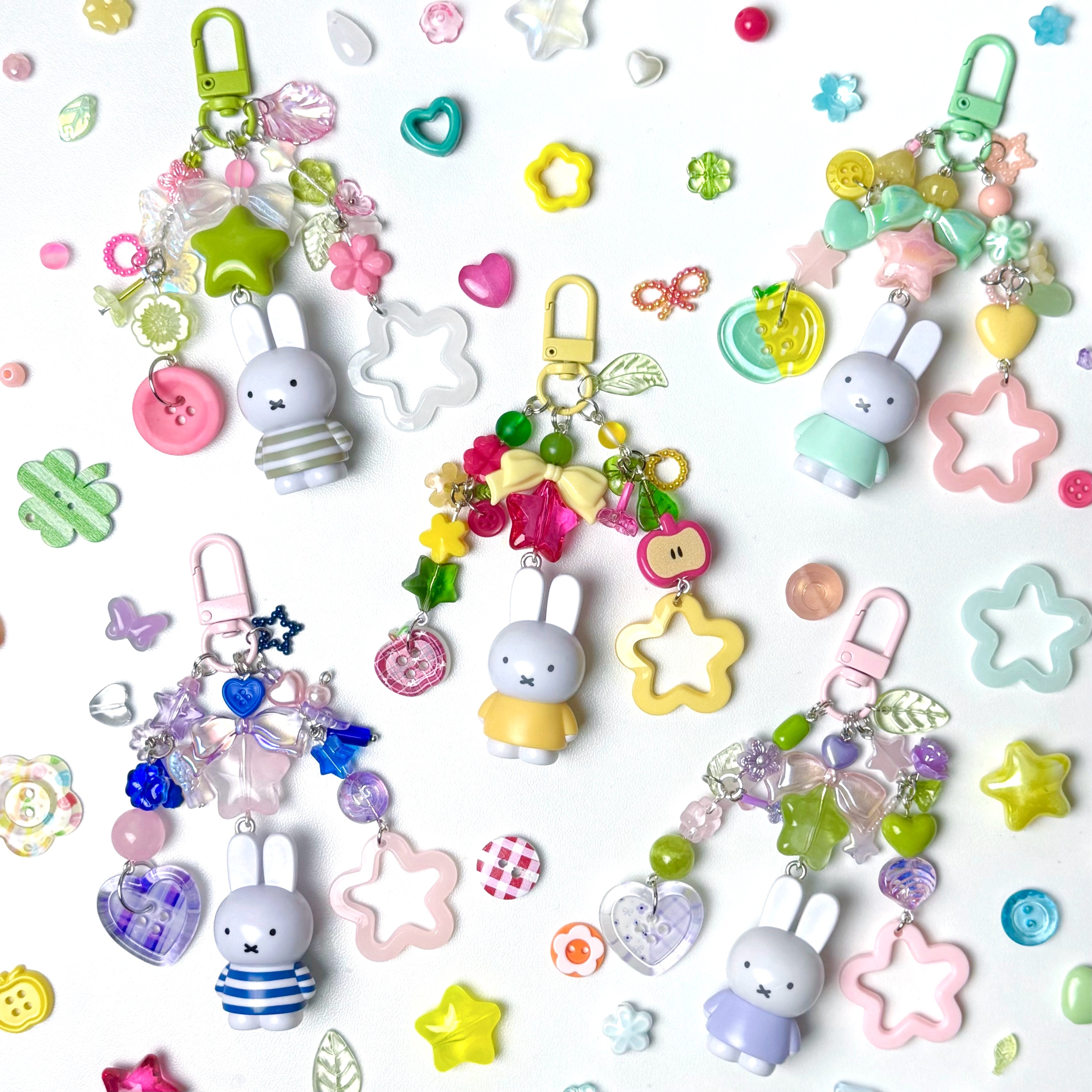 Colorful keychains with cartoon characters on a white background