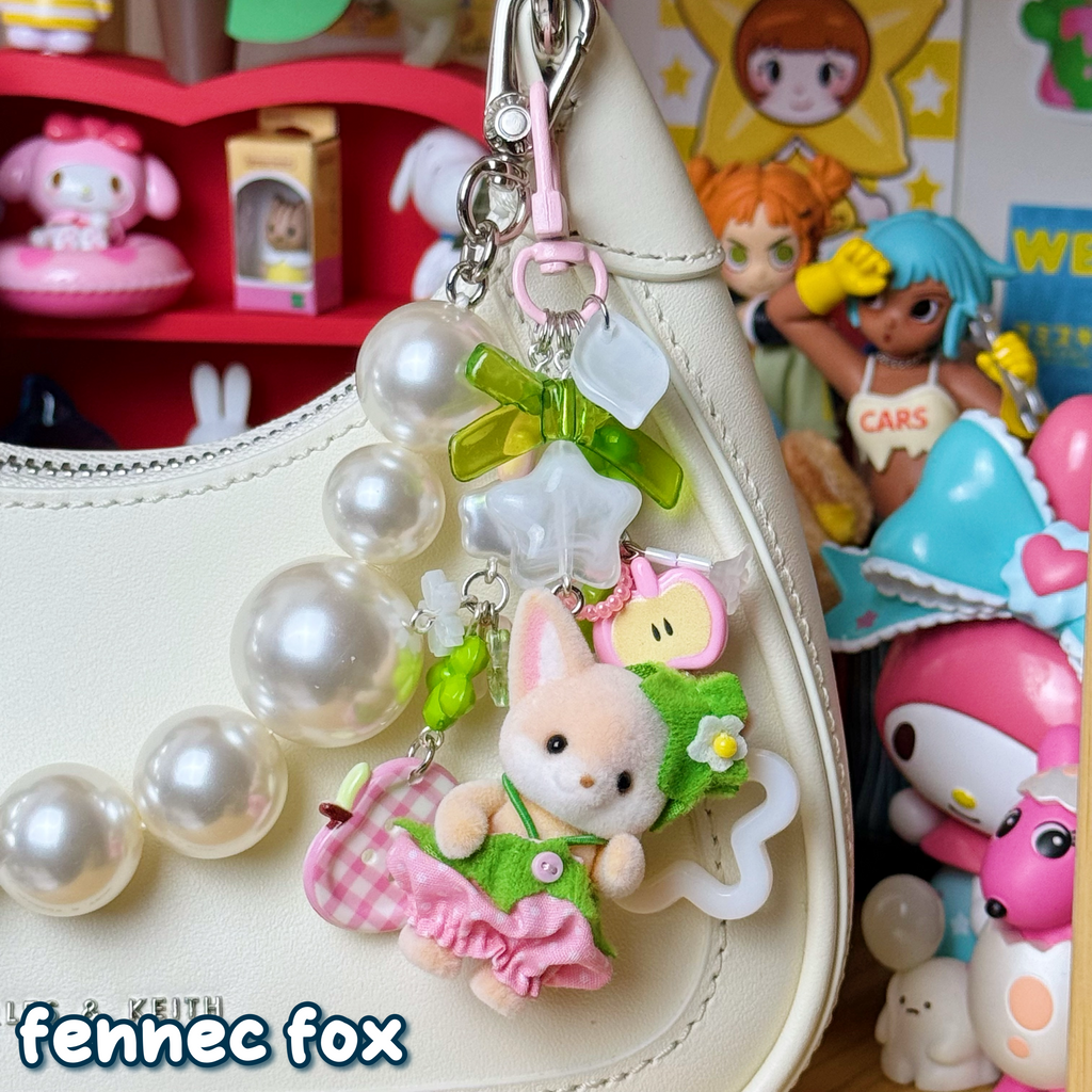 pink, green, & white strawberry fennec fox keychain