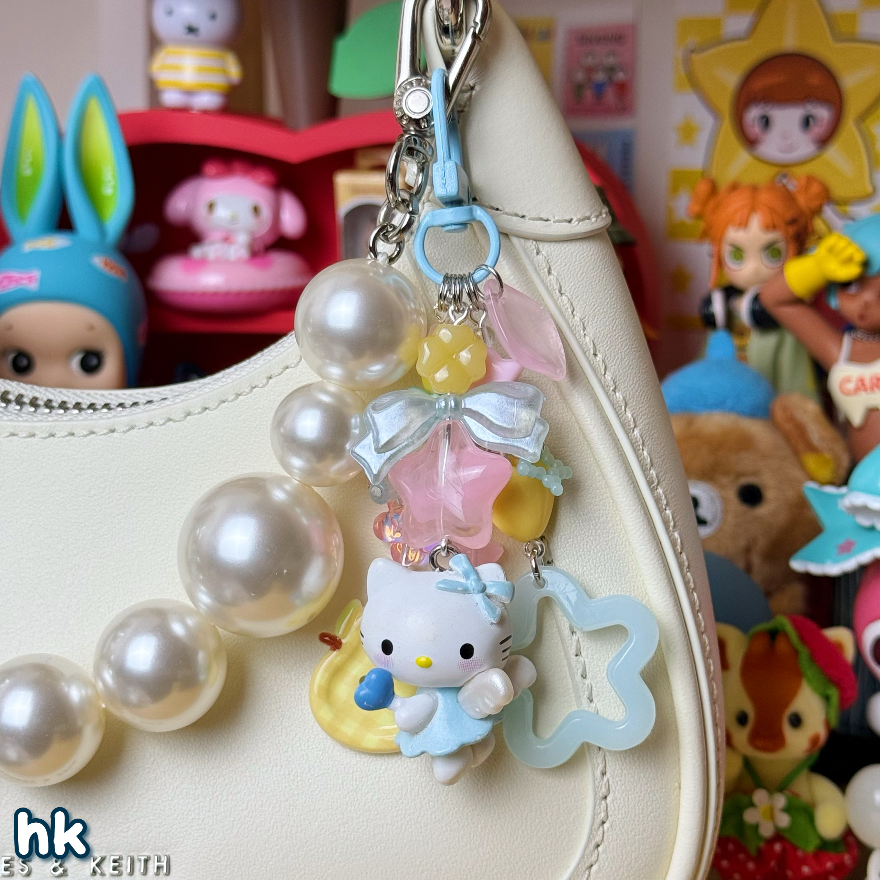 light blue, pink, & yellow hk keychain