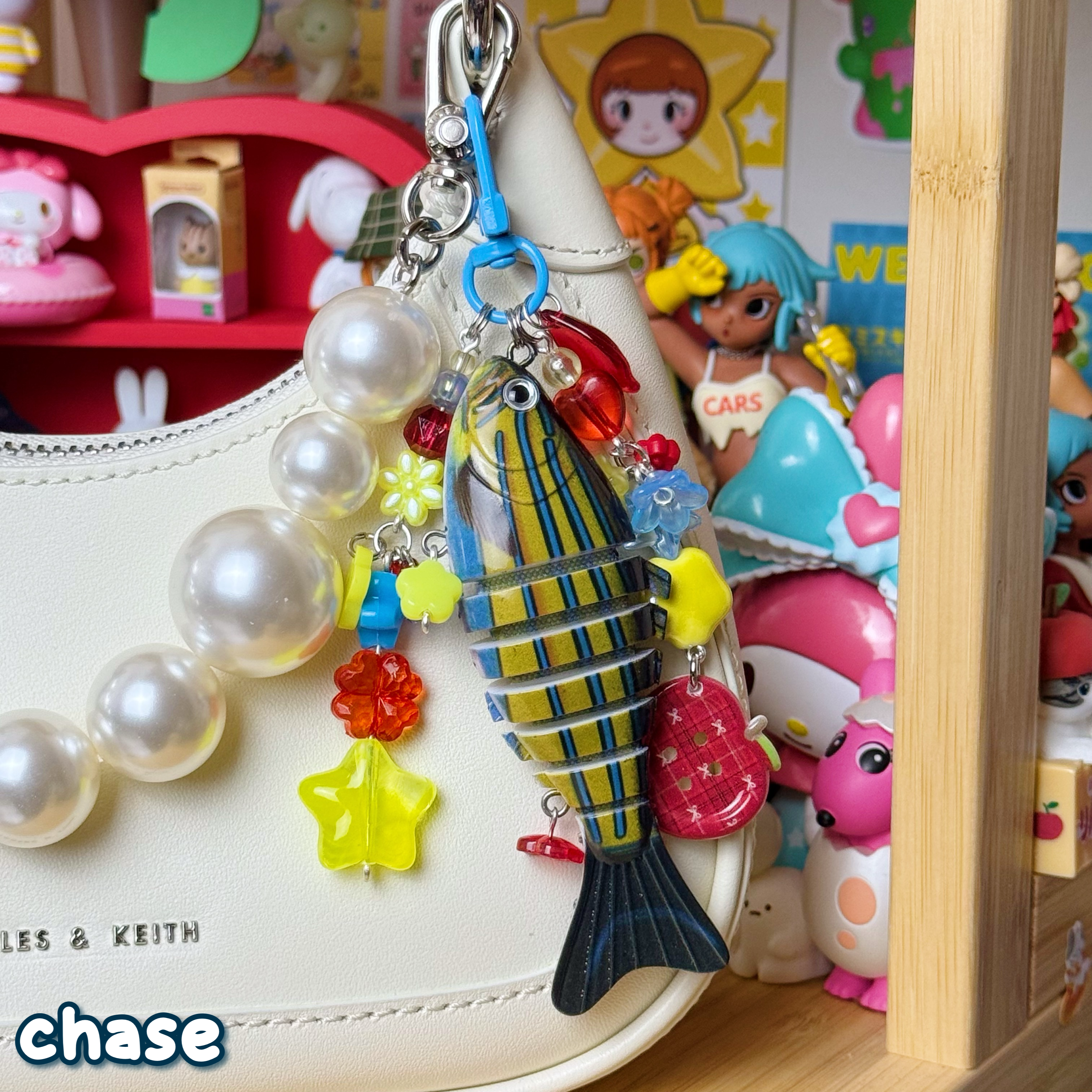 red, blue, & yellow chase fish keychain