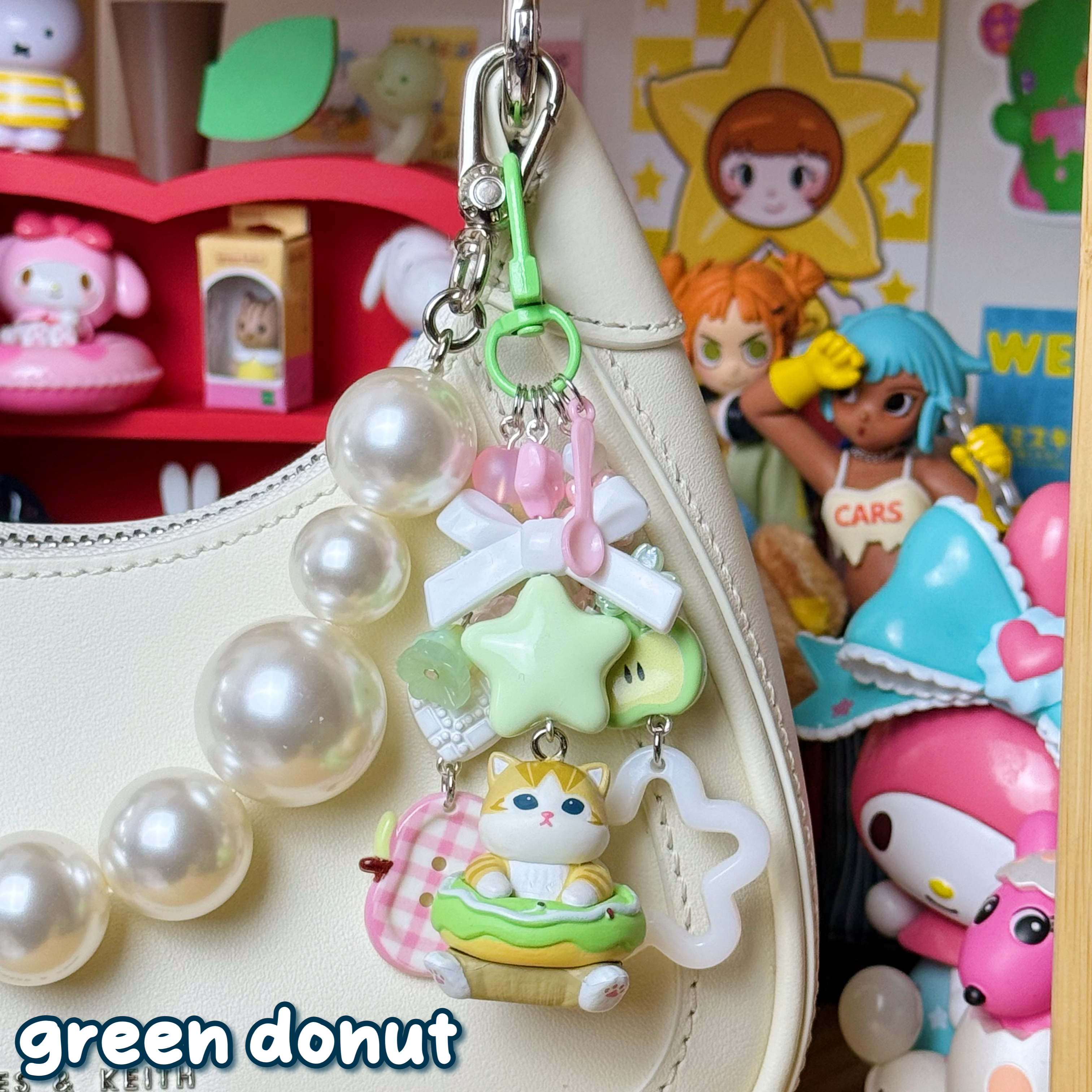 green donut mofusand cat keychain with green, pink, & white beads