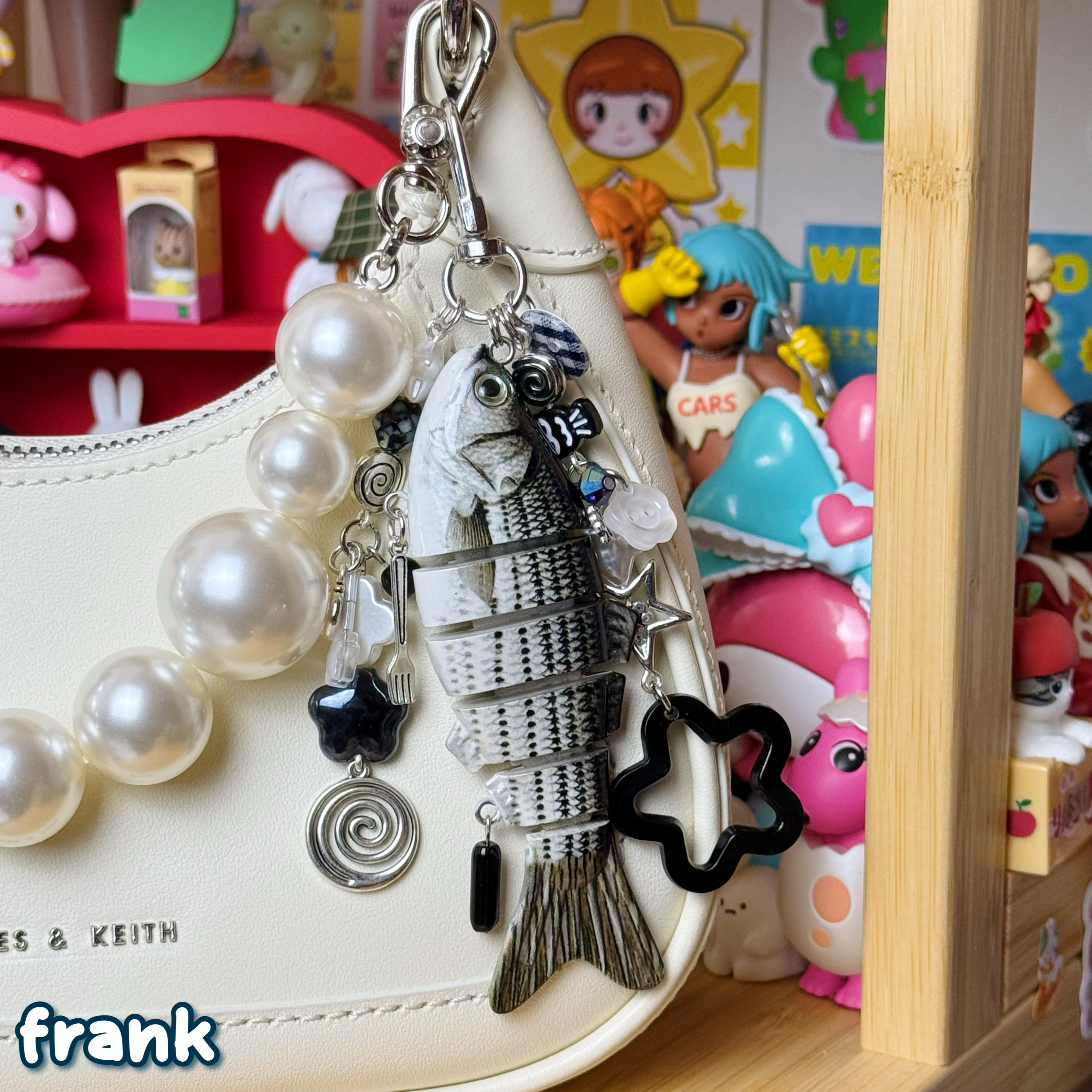 black, white, & silver frank fish keychain