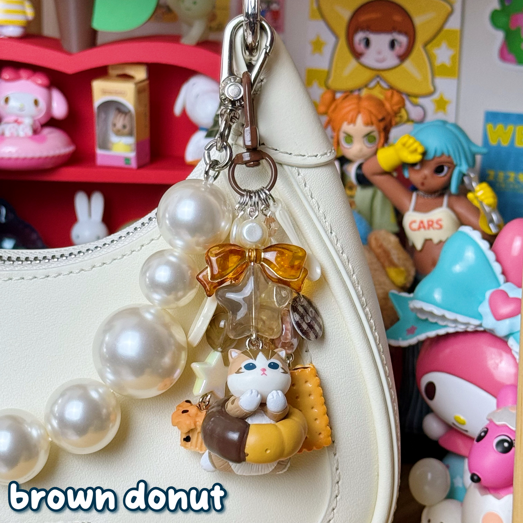 dark brown, beige, and off white brown donut mofusand cat keychain