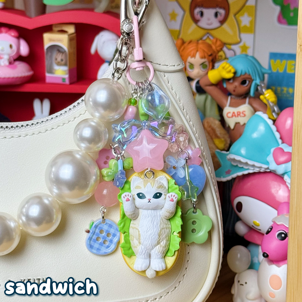 green, blue, & pink sandwich mofusand cat keychain