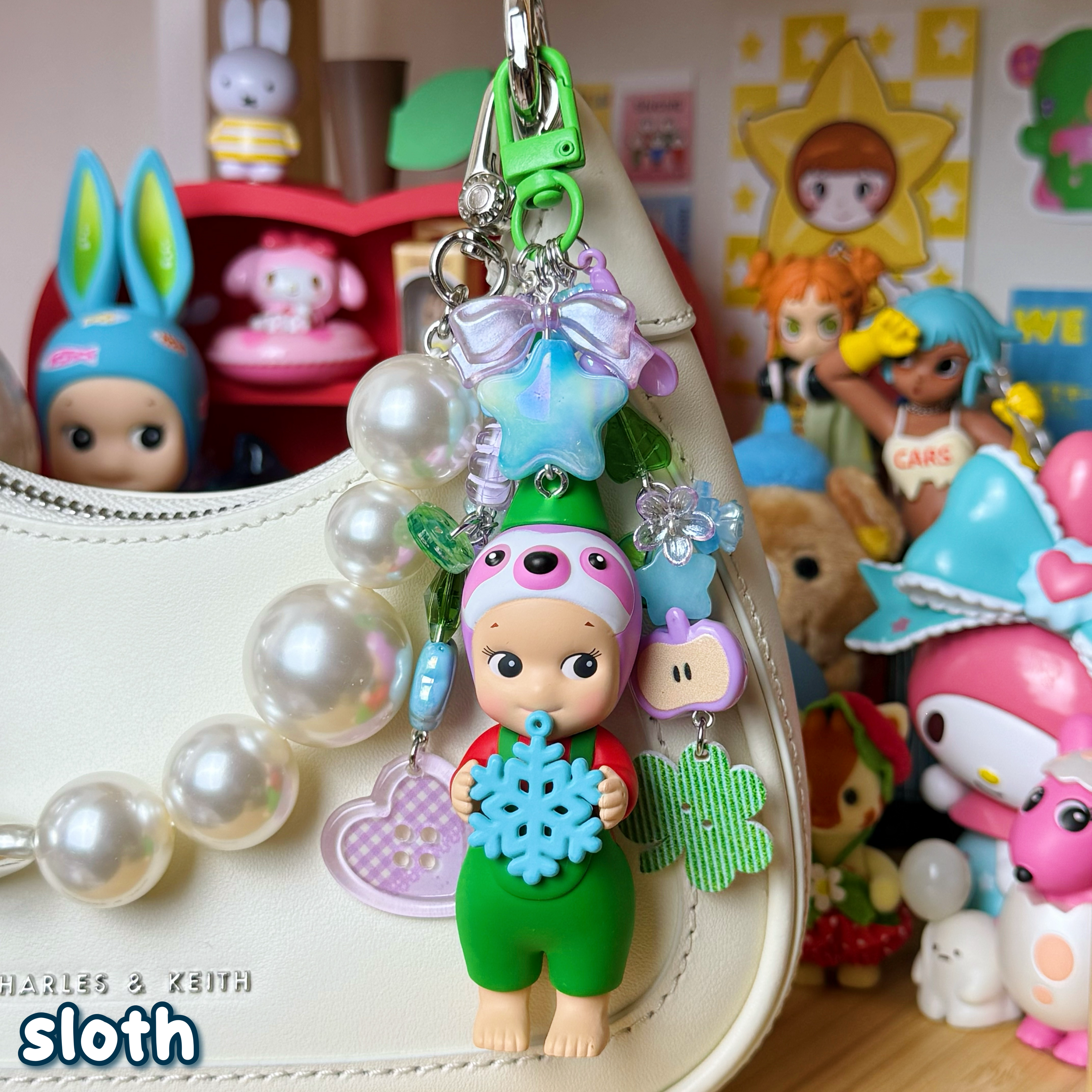 purple, blue, & green sloth sonny angel keychain