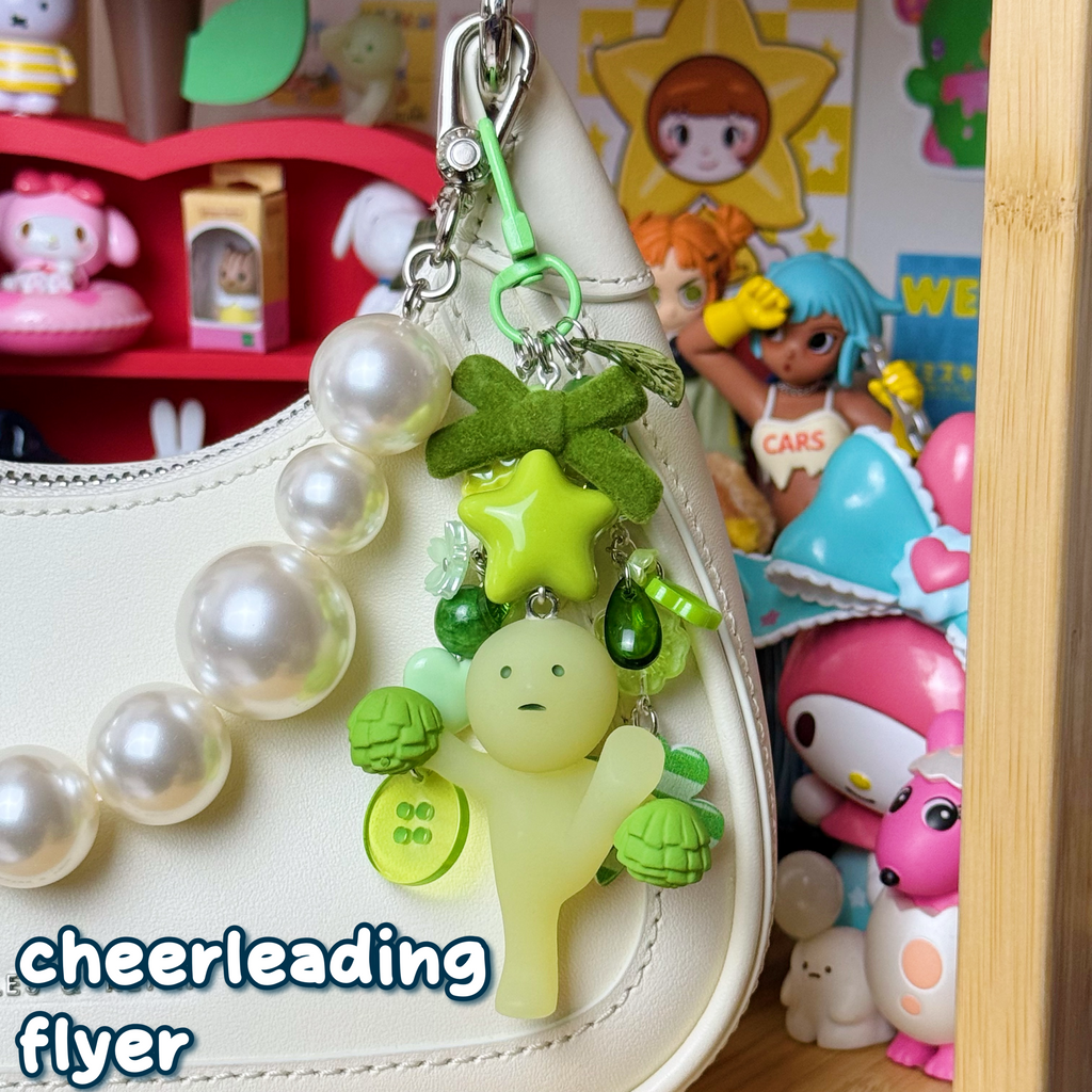 monochrome green cheerleading flyer smiski keychain