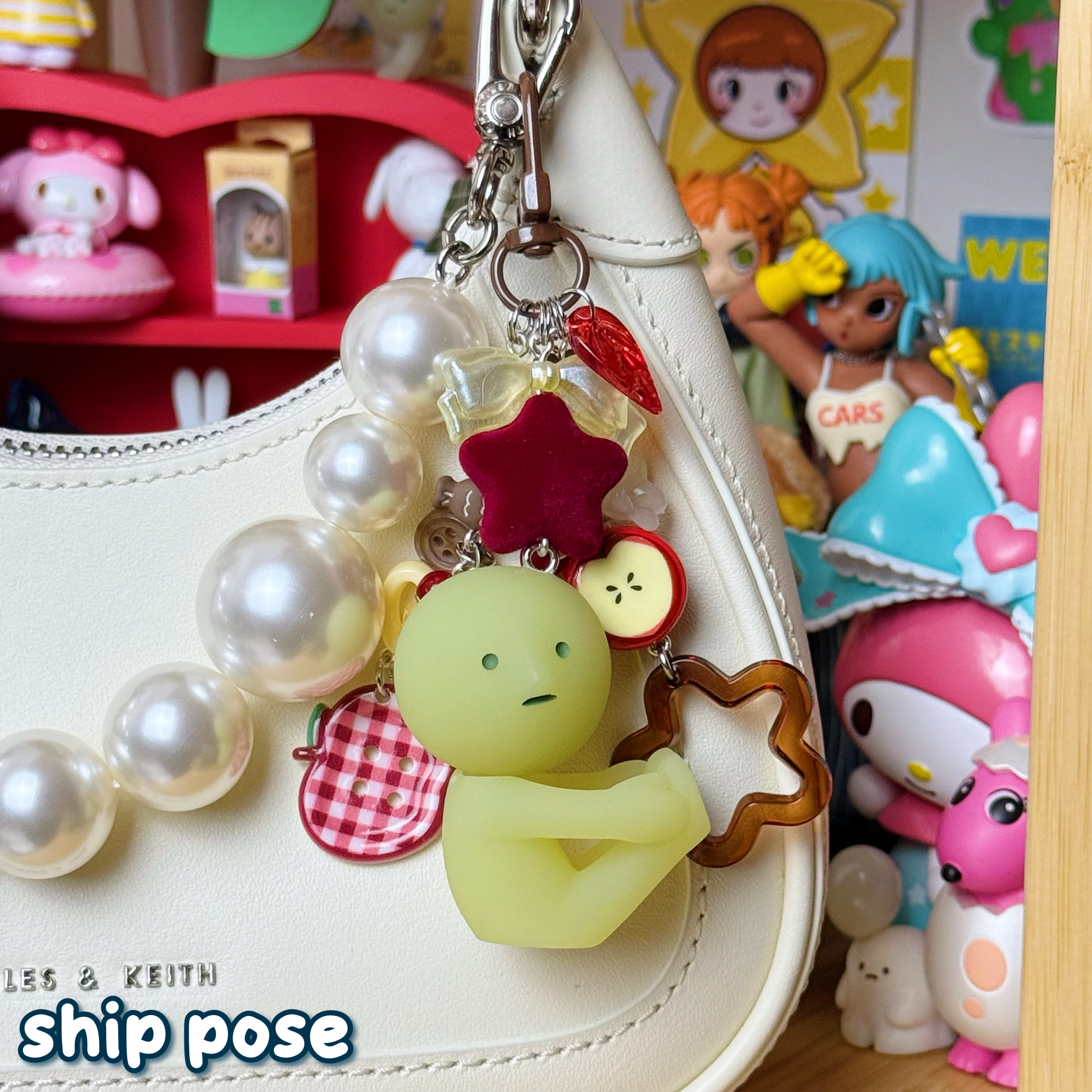 red, yellow, & brown ship pose smiski keychain