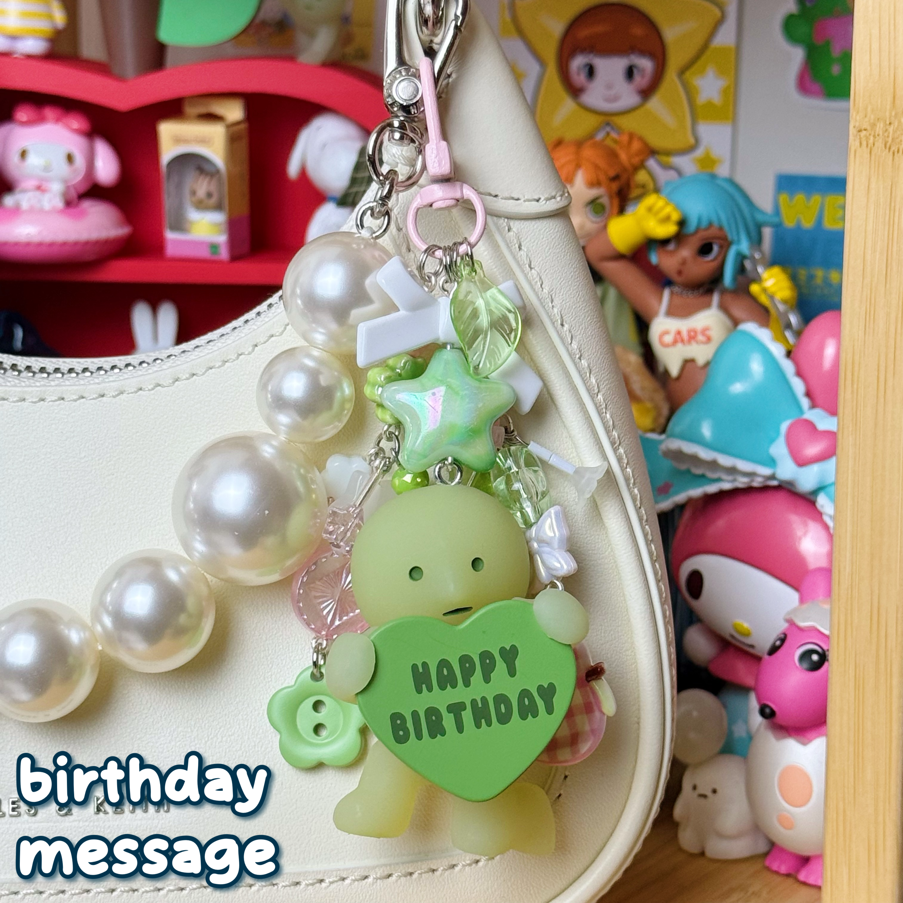 white, pink, & green birthday message smiski keychain