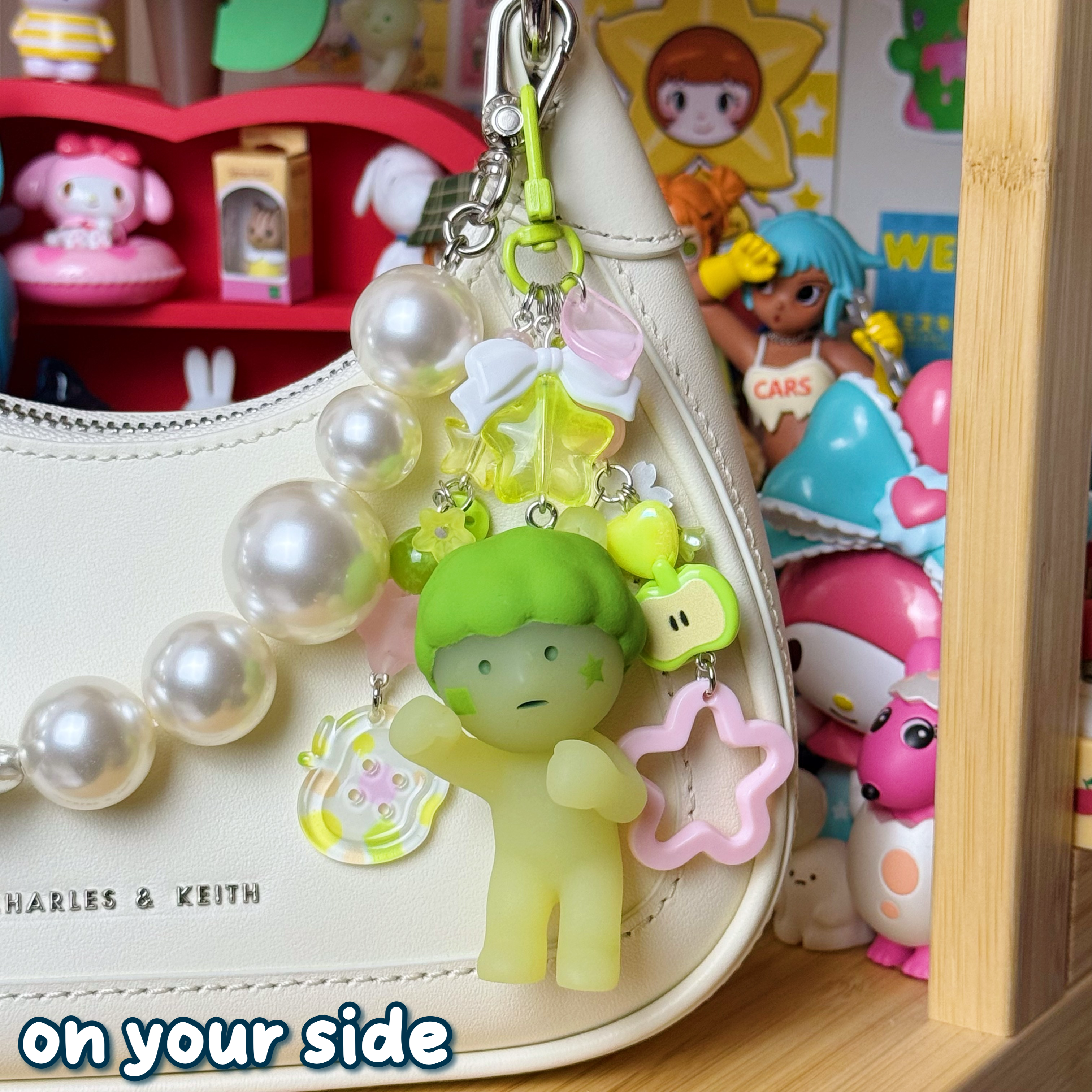 white, yellow, & green on your side smiski keychain