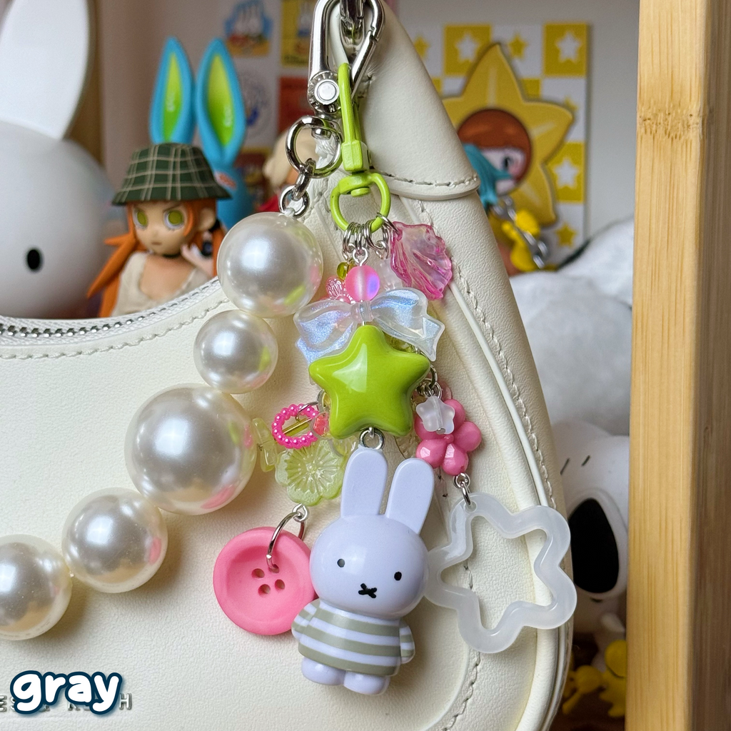 clear, pink, & green gray bunny keychain