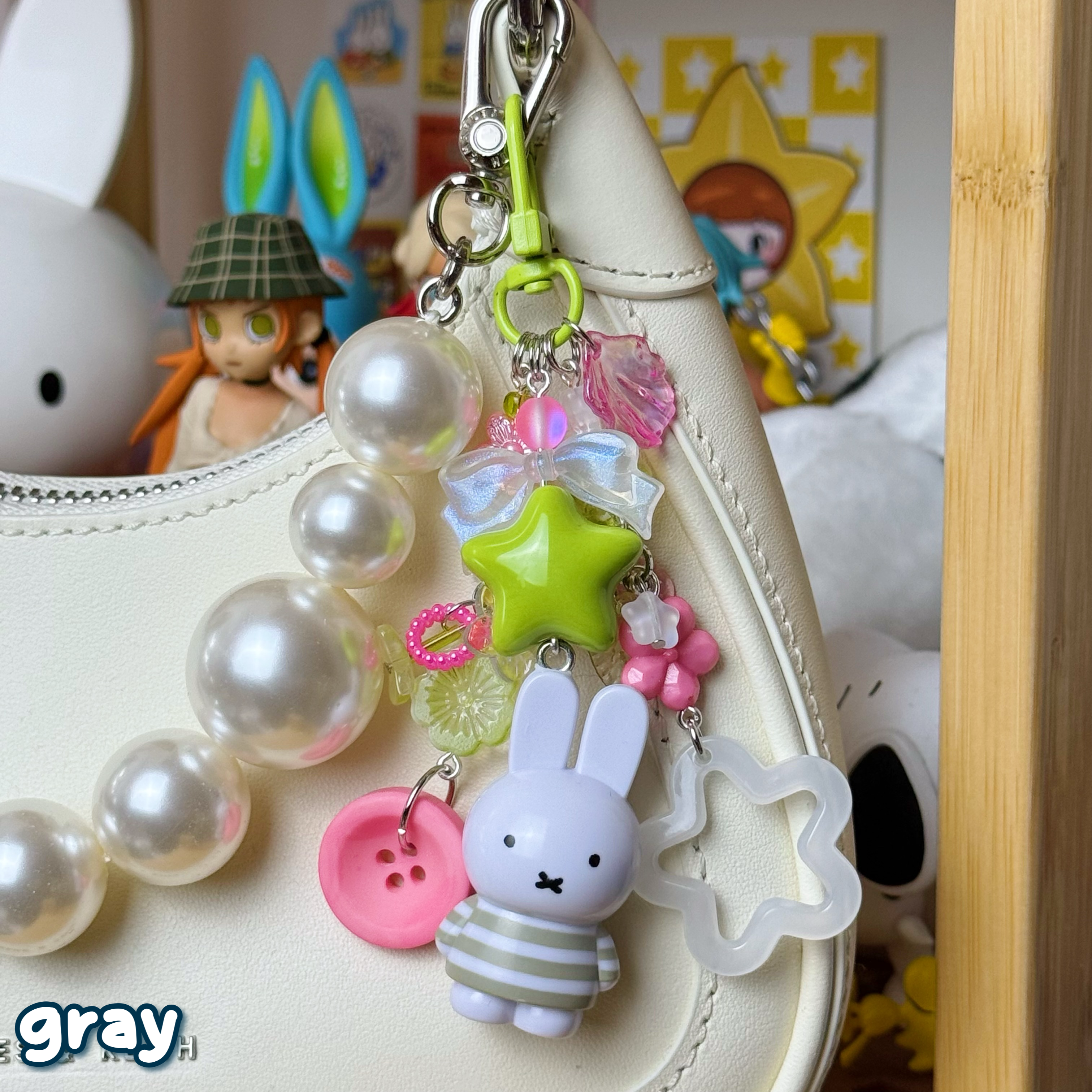 clear, pink, & green gray bunny keychain